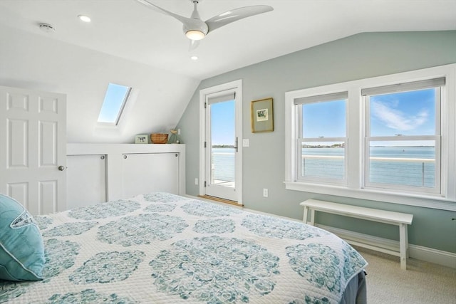 119 Fort Point Rd, Weymouth, MA 02191 - bedroom with vaulted ceiling, access to exterior, a skylight, baseboards, and ceiling fan
