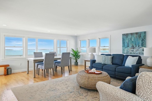 119 Fort Point Rd, Weymouth, MA 02191 - living area with plenty of natural light, wood finished floors, and recessed lighting