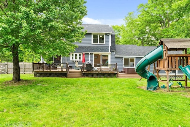 906 Clark St, Gardner, MA 01440 - back of house with a playground, a deck, and a shingled roof
