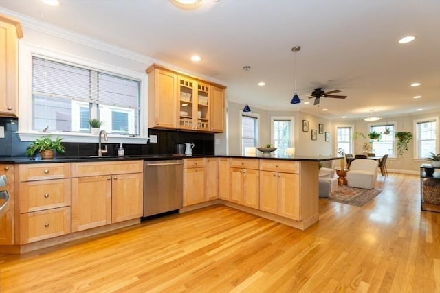 68 Line St Unit 2, Somerville, MA 02143 - kitchen with stainless steel dishwasher, a peninsula, recessed lighting, open floor plan, and light brown cabinets