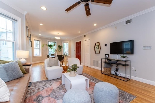 68 Line St Unit 2, Somerville, MA 02143 - living room featuring crown molding, ceiling fan, light wood-style floors, and recessed lighting