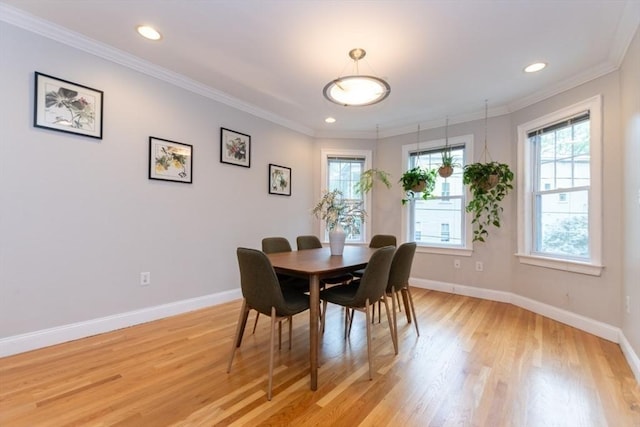 68 Line St Unit 2, Somerville, MA 02143 - dining space featuring light wood-style flooring, ornamental molding, and recessed lighting