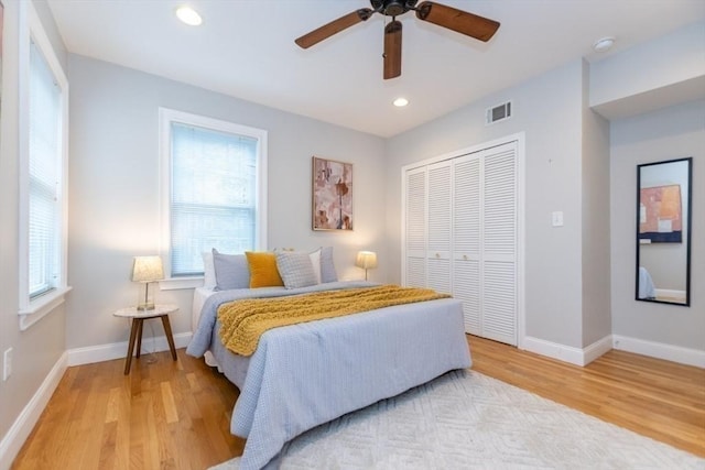 68 Line St Unit 2, Somerville, MA 02143 - bedroom featuring multiple windows, a closet, wood finished floors, recessed lighting, and a ceiling fan