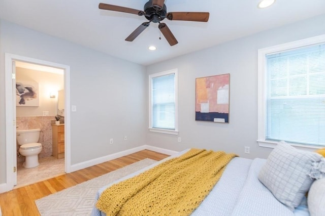 68 Line St Unit 2, Somerville, MA 02143 - bedroom featuring light wood-style flooring, recessed lighting, ensuite bath, and a ceiling fan