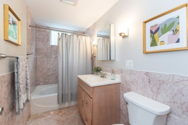 68 Line St Unit 2, Somerville, MA 02143 - full bath featuring vanity, tile walls, shower / bathtub combination with curtain, and a wainscoted wall