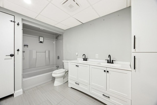 153 Milk St Unit 4, Westborough, MA 01581 - full bath featuring toilet, shower / bath combination, double vanity, tile patterned floors, and a drop ceiling