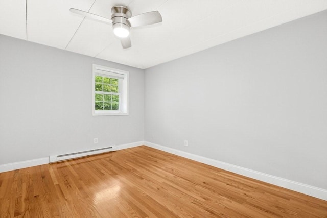 153 Milk St Unit 4, Westborough, MA 01581 - spare room with a baseboard radiator, baseboards, light wood-style floors, and ceiling fan