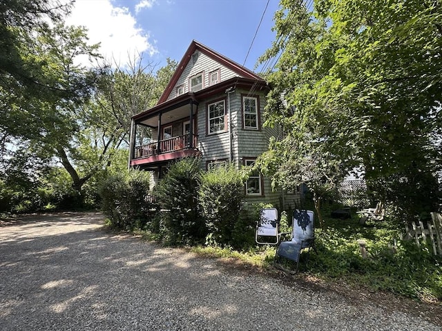 5-7 Prescott Pl, Boston, MA 02134 - view of property exterior with a balcony