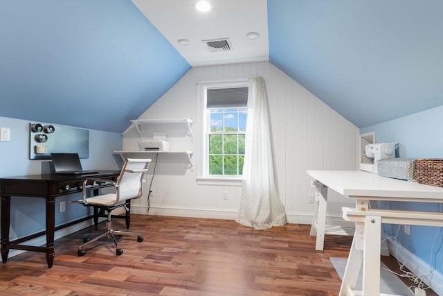 office featuring lofted ceiling and hardwood / wood-style floors