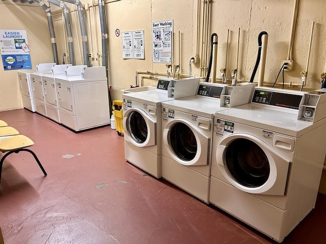 common laundry area with independent washer and dryer