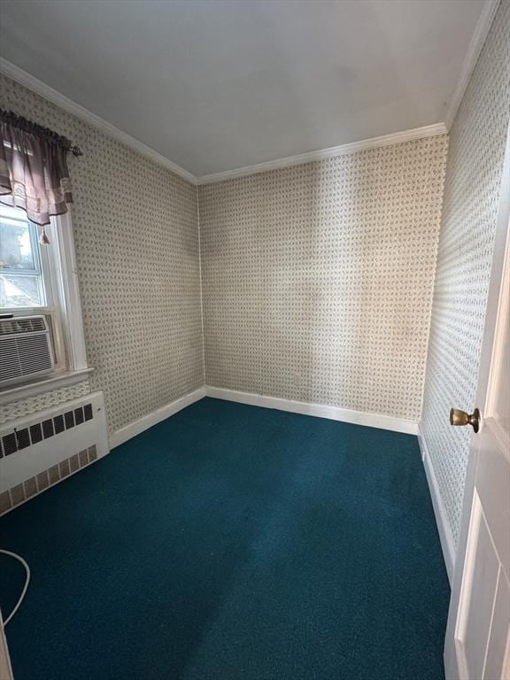 spare room with wallpapered walls, radiator heating unit, ornamental molding, cooling unit, and carpet flooring