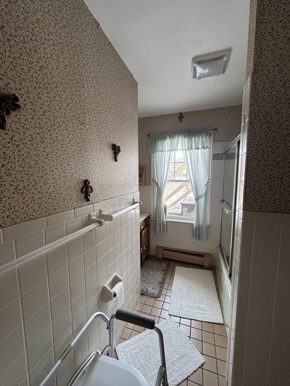 bathroom with a wainscoted wall, a baseboard heating unit, vanity, tile patterned floors, and wallpapered walls