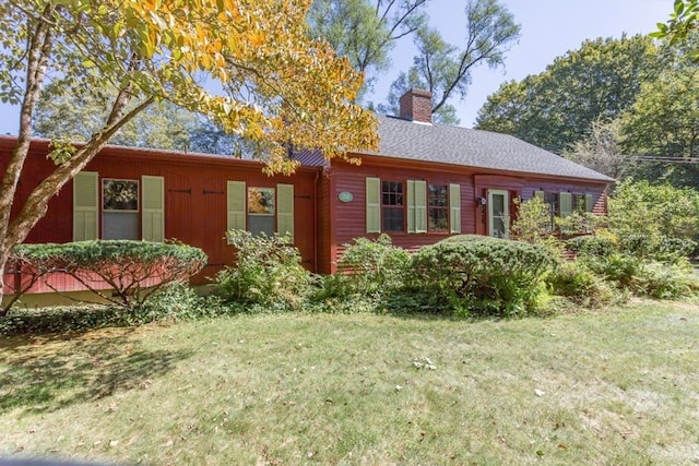 single story home with a front yard