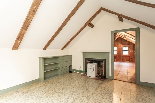 additional living space with high vaulted ceiling and beamed ceiling