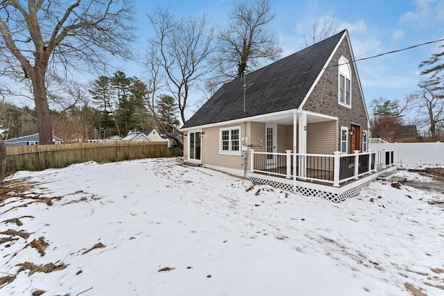 view of snow covered property