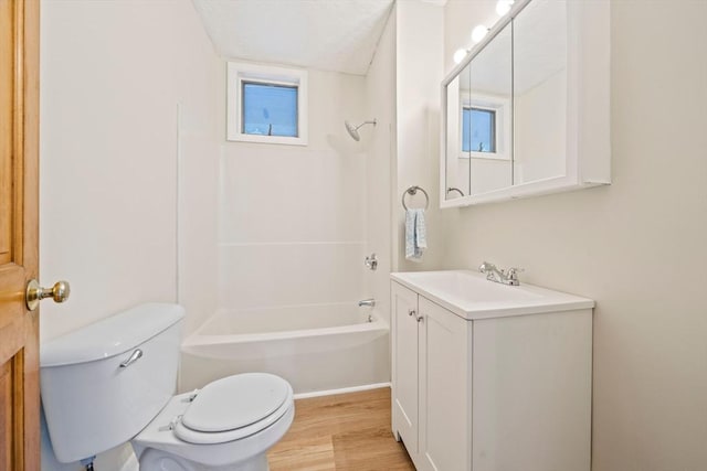84 Tremont St, Taunton, MA 02780 - bathroom featuring toilet, wood finished floors, vanity, and shower / tub combination