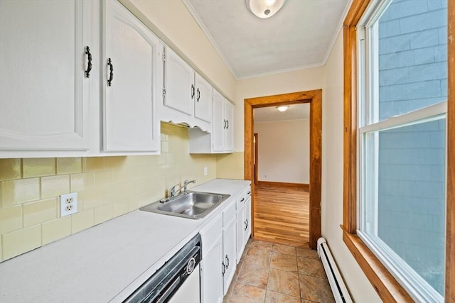 84 Tremont St, Taunton, MA 02780 - kitchen with a sink, dishwasher, white cabinets, ornamental molding, and baseboard heating
