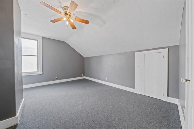 84 Tremont St, Taunton, MA 02780 - additional living space with carpet flooring, vaulted ceiling, baseboards, and a ceiling fan