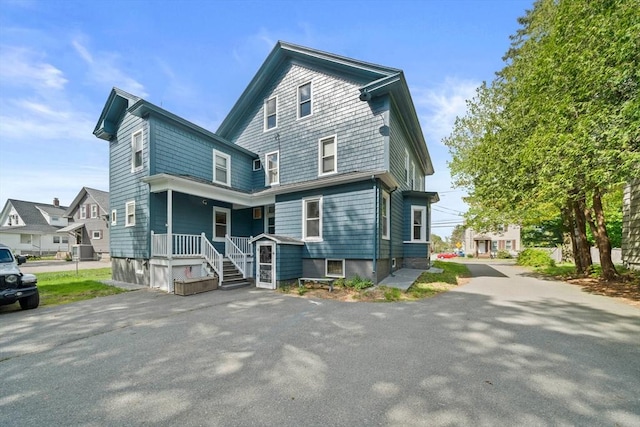 84 Tremont St, Taunton, MA 02780 - view of front of house featuring covered porch