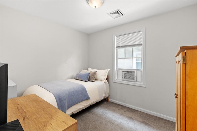 189 Progresso Ave, Woonsocket, RI 02895 - carpeted bedroom with cooling unit and baseboards