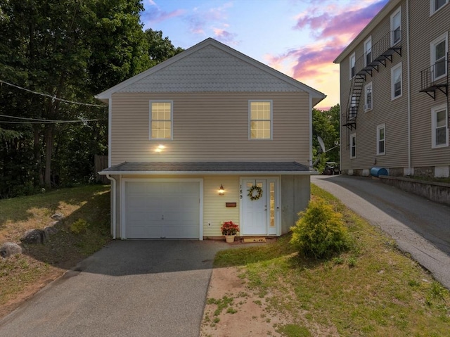 189 Progresso Ave, Woonsocket, RI 02895 - traditional-style home with driveway and a garage