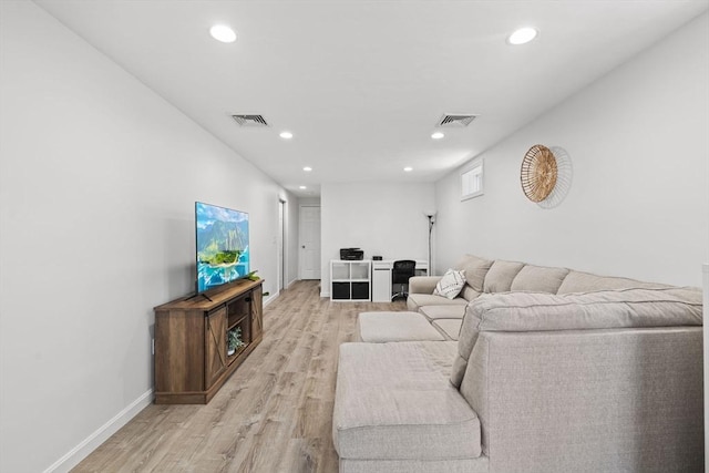 189 Progresso Ave, Woonsocket, RI 02895 - living area featuring light wood-style floors and recessed lighting
