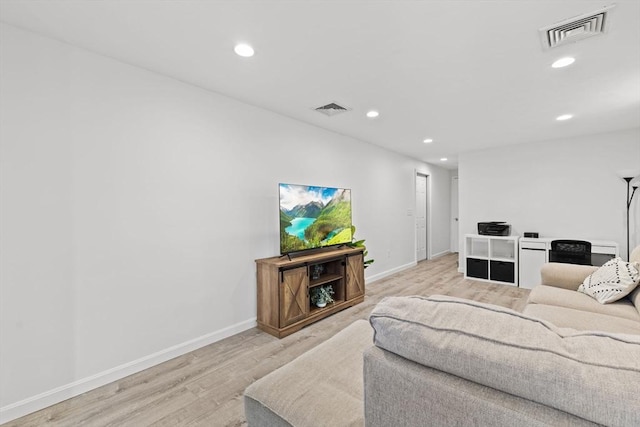 189 Progresso Ave, Woonsocket, RI 02895 - living room with recessed lighting and light wood finished floors