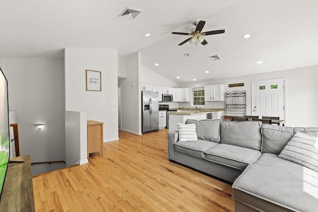 189 Progresso Ave, Woonsocket, RI 02895 - living room featuring ceiling fan, light wood finished floors, recessed lighting, and high vaulted ceiling