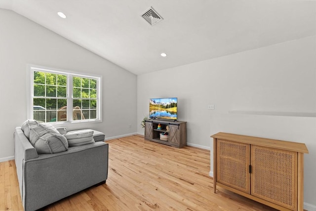 189 Progresso Ave, Woonsocket, RI 02895 - living area with lofted ceiling, wood finished floors, and recessed lighting
