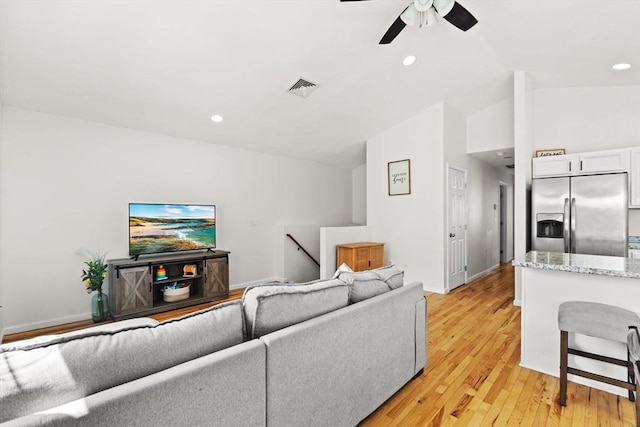 189 Progresso Ave, Woonsocket, RI 02895 - living room with vaulted ceiling, light wood-style floors, a ceiling fan, and recessed lighting