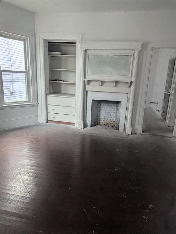 21 Mclellan St, Boston, MA 02121 - unfurnished living room with a fireplace