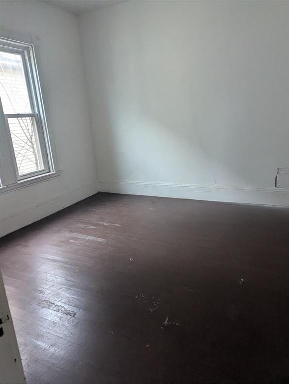 21 Mclellan St, Boston, MA 02121 - spare room with baseboards and hardwood / wood-style flooring