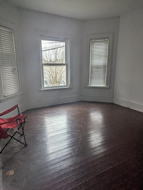 21 Mclellan St, Boston, MA 02121 - empty room with baseboards and wood finished floors