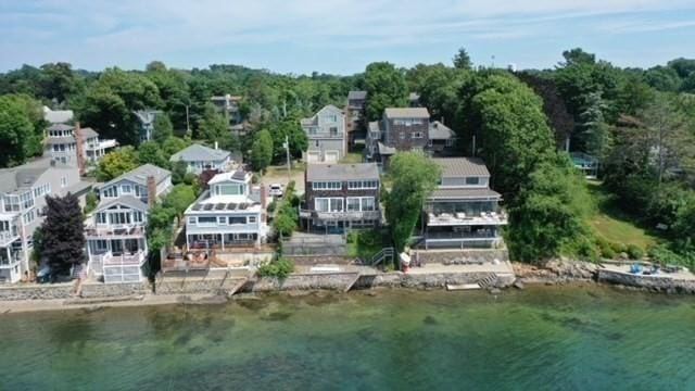 aerial view featuring a water view