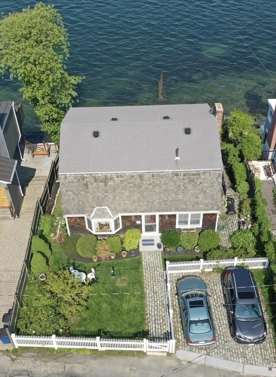 birds eye view of property featuring a water view