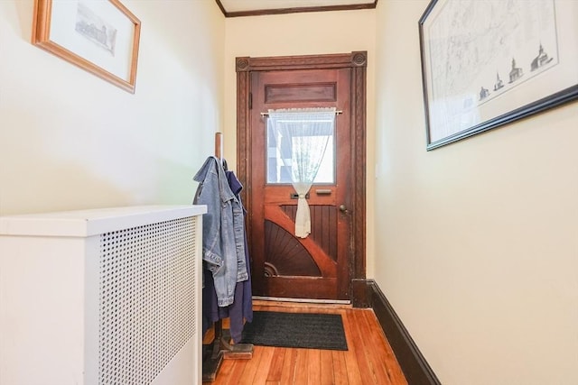 14 Baker St, Foxboro, MA 02035 - doorway featuring wood finished floors and ornamental molding