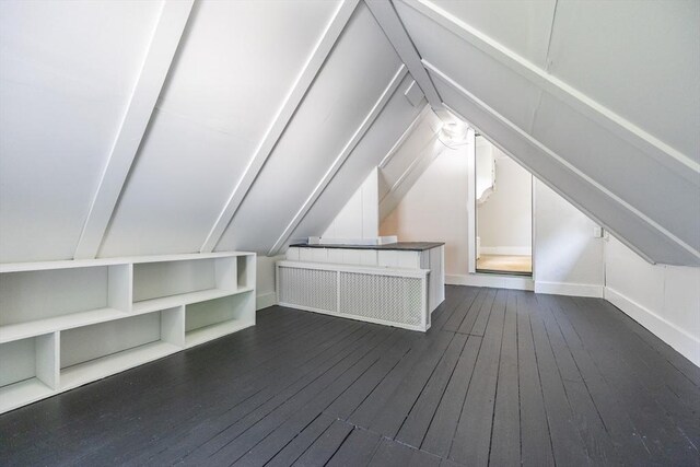 14 Baker St, Foxboro, MA 02035 - bonus room featuring dark wood finished floors and lofted ceiling