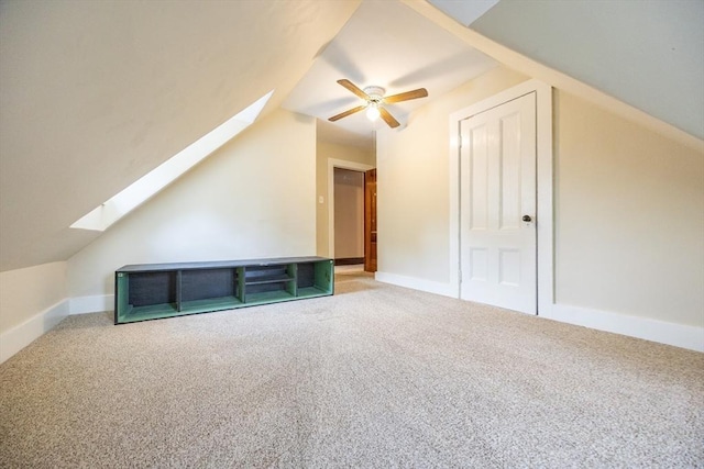 14 Baker St, Foxboro, MA 02035 - additional living space featuring a skylight, a ceiling fan, vaulted ceiling, and carpet flooring