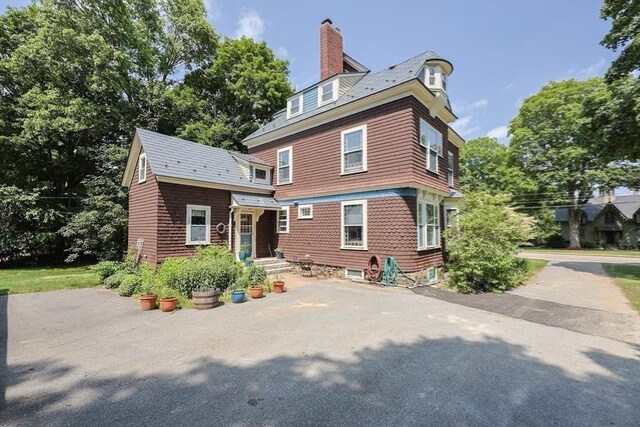 14 Baker St, Foxboro, MA 02035 - back of property featuring a chimney