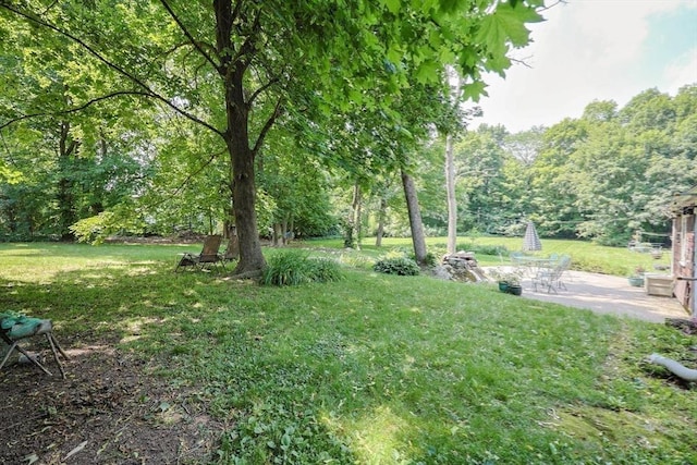 14 Baker St, Foxboro, MA 02035 - view of grassy yard with a patio