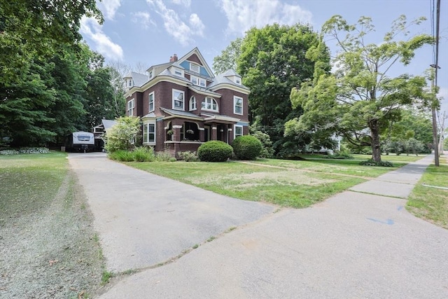 14 Baker St, Foxboro, MA 02035 - view of front facade featuring a front lawn, a chimney, and a porch