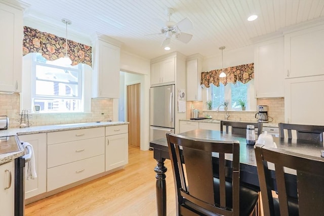 14 Baker St, Foxboro, MA 02035 - kitchen featuring stainless steel fridge, light wood-style flooring, decorative backsplash, electric range oven, and recessed lighting