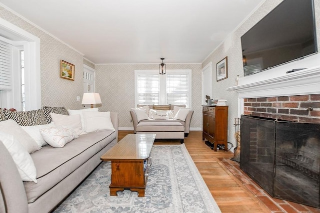 54 Converse Rd, Marion, MA 02738 - living room featuring ornamental molding, light wood-type flooring, wallpapered walls, a brick fireplace, and baseboards