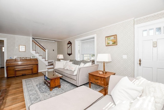 54 Converse Rd, Marion, MA 02738 - living room with wallpapered walls, crown molding, wood finished floors, and stairway