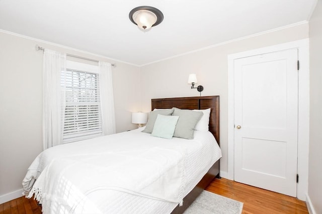 54 Converse Rd, Marion, MA 02738 - bedroom with wood finished floors, crown molding, and baseboards