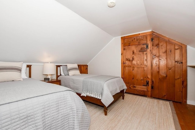 54 Converse Rd, Marion, MA 02738 - bedroom featuring vaulted ceiling and wood finished floors