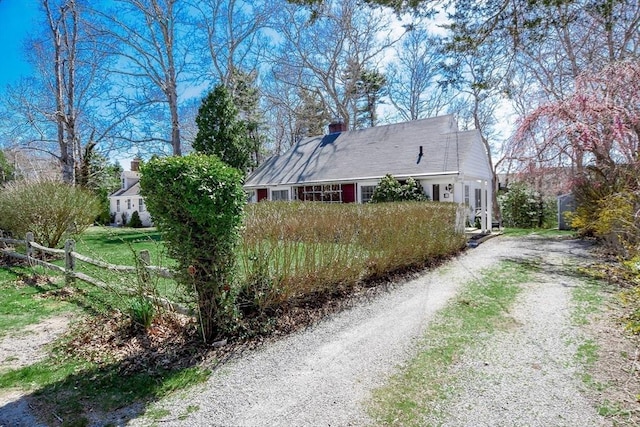 54 Converse Rd, Marion, MA 02738 - view of side of property featuring driveway and a chimney