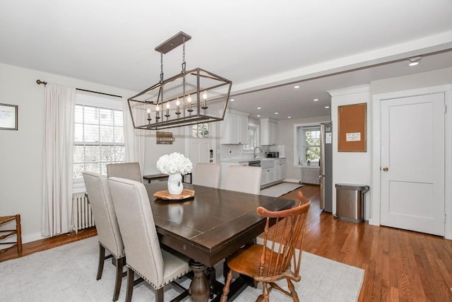 54 Converse Rd, Marion, MA 02738 - dining space featuring a chandelier, light wood-type flooring, recessed lighting, and baseboards