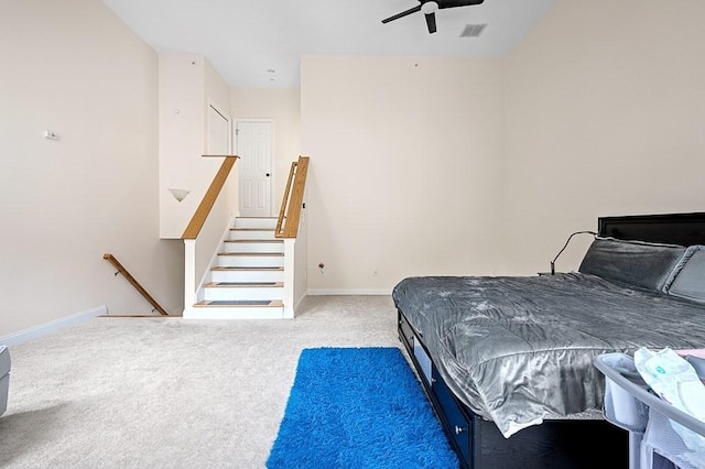 bedroom featuring carpet floors, baseboards, and ceiling fan