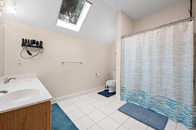 full bathroom with a skylight, toilet, vaulted ceiling, tile patterned floors, and baseboards